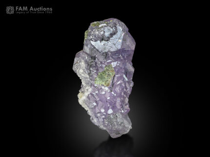A lustrous apatite with riebeckite inclusion from Pakistan.