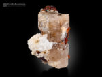 Apatite with etched spessartine garnet from Pakistan.