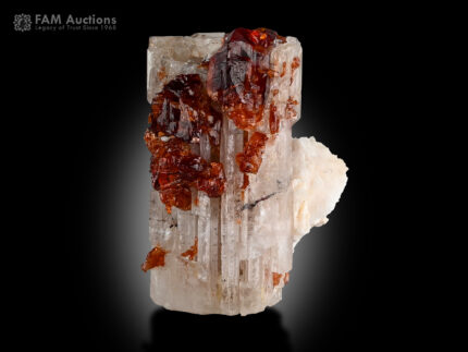 Apatite with etched spessartine garnet from Pakistan.