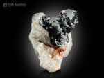 Hematite cluster with rutile & adularia on matrix from Pakistan.