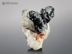 Hematite cluster with rutile & adularia on matrix from Pakistan.