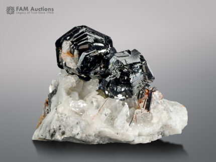 Hematite cluster with rutile & adularia on matrix from Pakistan.