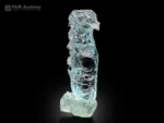 Deep blue etched aquamarine crystal from Shigar Valley, Pakistan, self-standing floater with high luster.