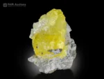 Vivid lemon-yellow brucite crystal perched on matrix from Qila Saifullah, Pakistan
