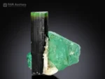 Natural green tourmaline crystal combined with fluorite and albite, a rare mineral specimen for collectors and display.