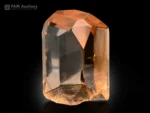 Golden topaz natural crystal from Pakistan. With glassy luster and perfect termination.