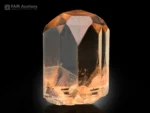 Golden topaz natural crystal from Pakistan. With glassy luster and perfect termination.