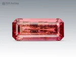 Emerald cut hot pink tourmaline gemstone from Afghanistan showing natural inclusions
