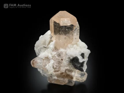 Image Alt Text: Natural topaz crystal on albite with schorl from Pakistan.