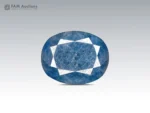 12.95 ct oval cut blue sapphire gemstone from Madagascar showing pink fluorescence under UV light