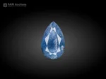 34.15 carat pear cut dumortierite included quartz gemstone from Bahia, Brazil, with blue needle inclusions