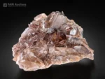 Brown axinite crystals cluster with wedge-shaped crystals from Pakistan.