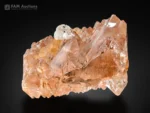 Etched champagne colored topaz crystal with natural sculpted surfaces