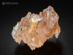 Etched champagne colored topaz crystal with natural sculpted surfaces