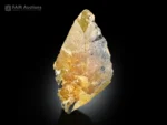 Lustrous honey colored titanite crystal with sharp wedge shaped form.