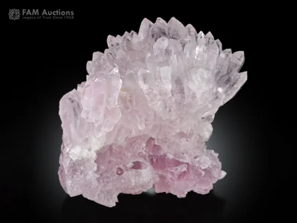 Soft pink rose quartz crystal cluster with sharp crystal growth.