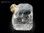Clear quartz crystal with albite crystal attached