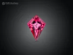 Kite cut rhodolite garnet gemstone with vibrant pink color and eye-clean clarity.