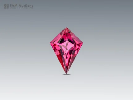 Kite cut rhodolite garnet gemstone with vibrant pink color and eye-clean clarity.