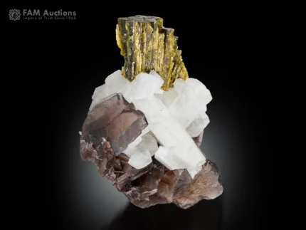 Axinite with white adularia and green epidote crystals from Pakistan.