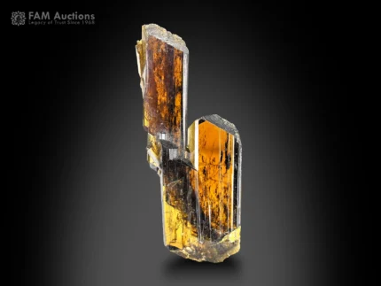 Golden brown epidote crystal with sharp prismatic form from Pakistan.