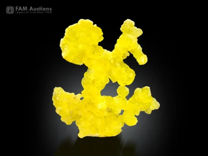 Bright yellow brucite mineral specimen with sculptural rounded formation from Pakistan.