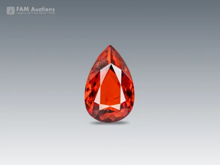 Oval cut bastnasite gemstone, brown red 7.10 ct Pakistan Zagi Mountain.