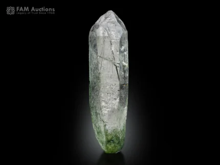 Quartz crystal with actinolite needle inclusions and chlorite base, Pakistan specimen.