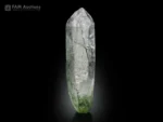 Quartz crystal with actinolite needle inclusions and chlorite base, Pakistan specimen. Quartz crystal with actinolite needle inclusions and chlorite base, Pakistan specimen.