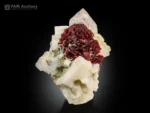 Etched spessartine garnet on quartz with albite, Pakistan mineral specimen.