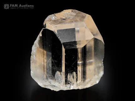 Clear topaz crystal with sharp faces and high luster mineral specimen.