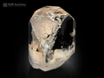 Clear topaz crystal with sharp faces and high luster mineral specimen.