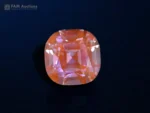 11.10 carat cushion-cut purple apatite gemstone with brilliant luster.