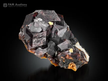Cluster growth of lustrous Andradite Garnet crystals with sharp geometric formations