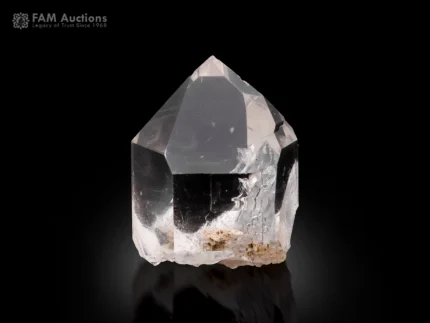 Clear quartz crystal with excellent clarity and sharp termination.
