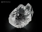 Clear Gwindel Quartz crystal with twisted formation and excellent transparency.