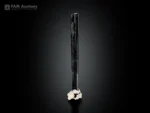 Elongated black schorl crystal with white albite matrix from Pakistan