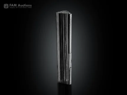 Elongated black Schorl Tourmaline crystal with sharp vertical striations from Pakistan.