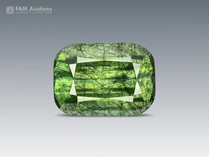 Natural green cushion-cut gemstone weighing 7 ct with distinctive Ludwigite inclusions
