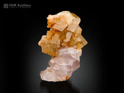 Pink apatite crystals associated with calcite display excellent contrast.