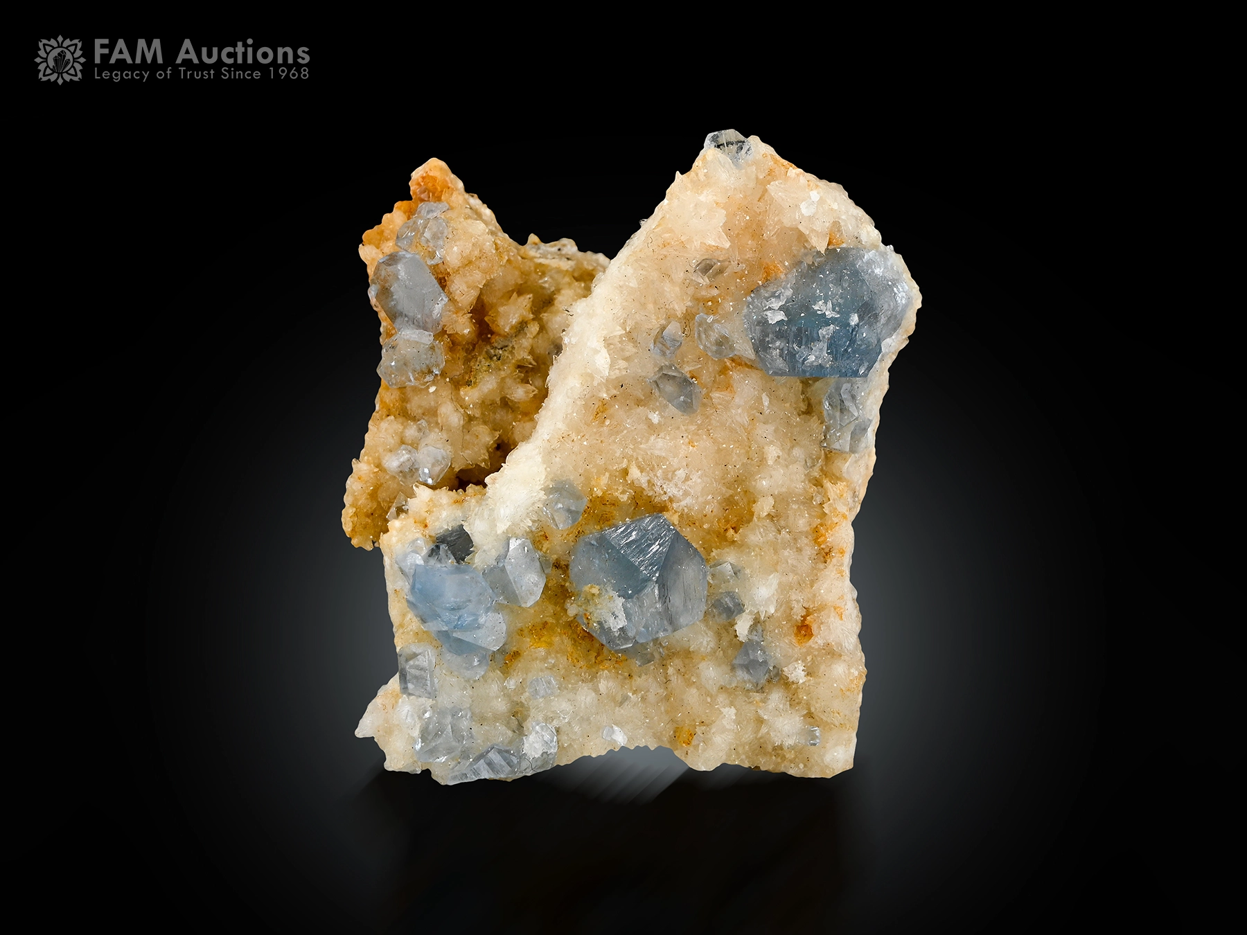 Pale blue celestine crystals on calcite matrix. Pale blue celestine crystals on calcite matrix.