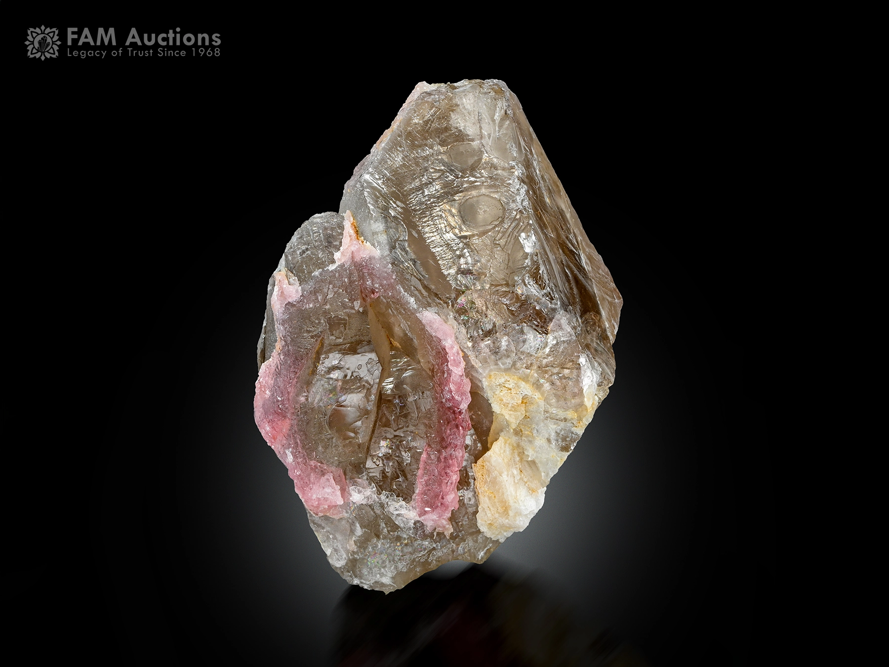 Pink Rose Quartz on Smoky Quartz Pink rose quartz crystal growth on translucent smoky quartz from Afghanistan.