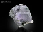 Lavender apatite crystal with black riebeckite needle inclusions from Mohmand Agency, Khyber Pakhtunkhwa, Pakistan.