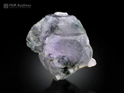 Lavender apatite crystal with black riebeckite needle inclusions from Mohmand Agency, Khyber Pakhtunkhwa, Pakistan.