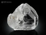 Clear quartz crystal displaying an attractive Gwindel formation with sharp faces and excellent transparency