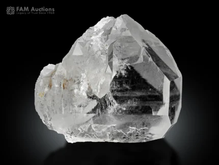 Clear quartz crystal displaying an attractive Gwindel formation with sharp faces and excellent transparency