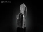 Black Schorl Tourmaline crystal with pronounced vertical striations and prismatic form