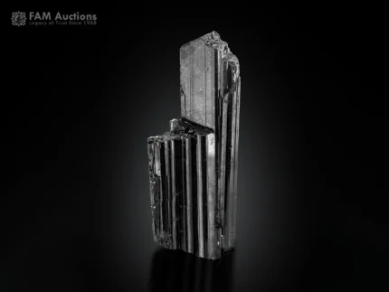 Black Schorl Tourmaline crystal with pronounced vertical striations and prismatic form