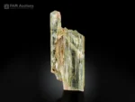 Transparent pale yellow-green triphane spodumene crystal with natural striations from Afghanistan.