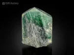 Green apatite crystal with byssolite inclusions and a sharp natural termination.